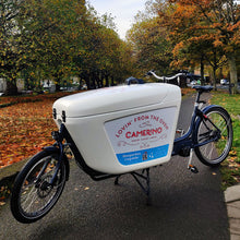 Load image into Gallery viewer, A close-up photo of the branding on a Raleigh Pro ecargo bike featuring the Camerino logo.