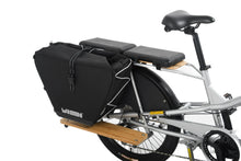 Load image into Gallery viewer, A product image showing the Yuba Eco Baguette bike bag attached to the rear rack of a Yuba Longtail cargo bike.
