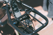Load image into Gallery viewer, A product picture of the Yuba FrontRack accessory which attaches to the front of Yuba electric longtail cargo bikes. The FrontRack is shown here attached to a Yuba FastRack electric longtail cargo bike.