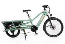 Load image into Gallery viewer, A product image of the Yuba Spicy Curry V4 electric longtail cargo bike. The frame colour is Lunar (a pale green colour) and the bike is in its basic set up, with no accessories attached.