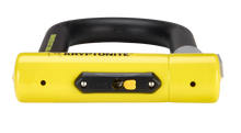 Load image into Gallery viewer, An end view of the Kryptonite New York Diamond lock showing the keyhole and the dust cover for the keyhole.

