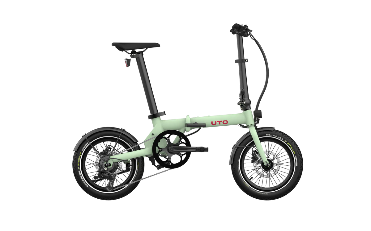 Green folding bike on a white background