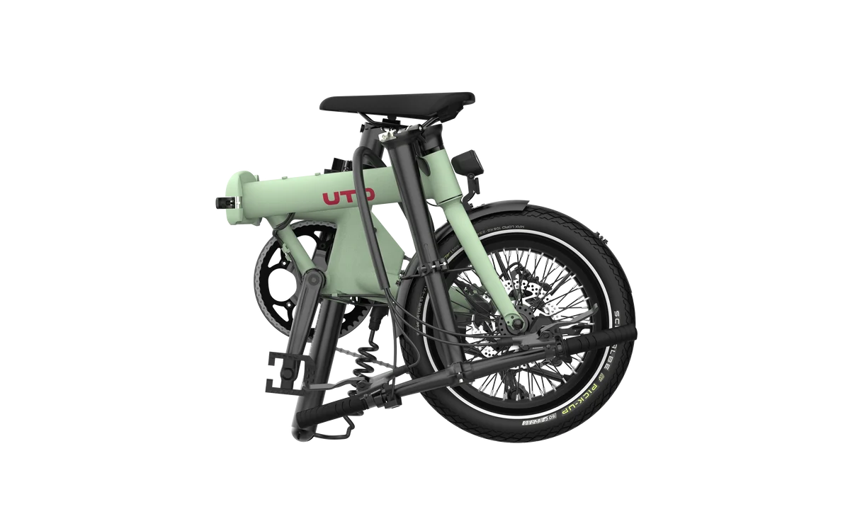 Green folding bike on a white background
