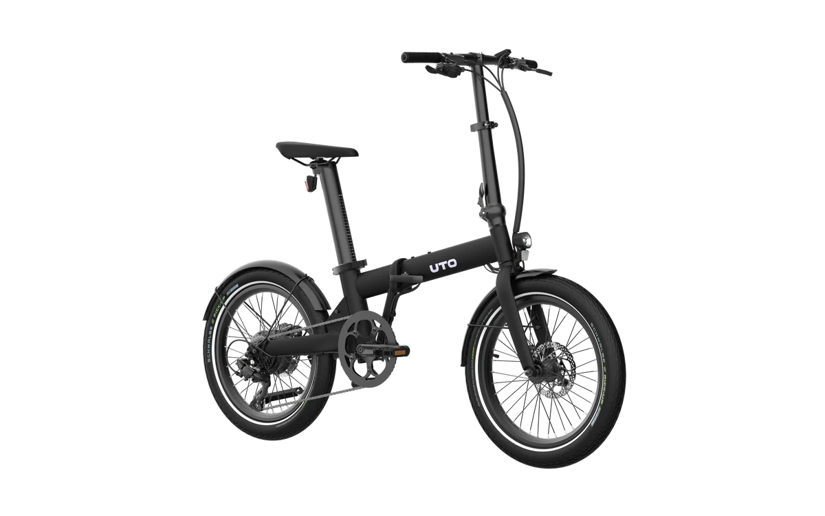 Black folding bike on a white background