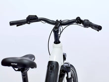 Load image into Gallery viewer, White electric bike with black handlebars and seat on a light gray background.
