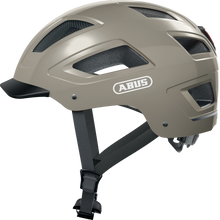 Load image into Gallery viewer, A product image of the Abus Hyban 2.0 cycle safety helmet, showing the colour option for Monument Grey.
