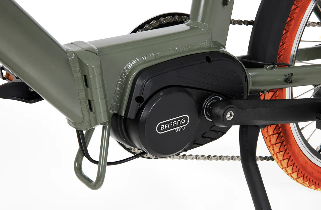 A product image of the Veloci Hopper folding electric bike from LeaseBike, showing a close-up detail of the Bafang M300 mid-drive electric motor which is positioned at the bottom bracket of the bike, in between the pedals. 