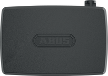 Load image into Gallery viewer, Black rectangular device with 'ABUS' branding on a white background
