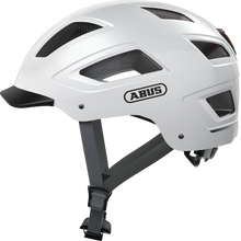 Load image into Gallery viewer, A product image of the Abus Hyban 2.0 cycle safety helmet, showing the colour option for Polar White.

