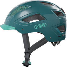Load image into Gallery viewer, A product image of the Abus Hyban 2.0 cycle safety helmet, showing the colour option for Core Green.
