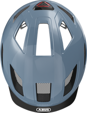 Load image into Gallery viewer, A product image of the Abus Hyban 2.0 cycle safety helmet, showing the colour option for Glacier Blue, from the top of the helmet.
