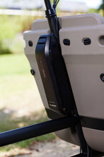 Load image into Gallery viewer, A lifestyle image showing the Bosch battery on the Dolly Joy electric cargo bike.
