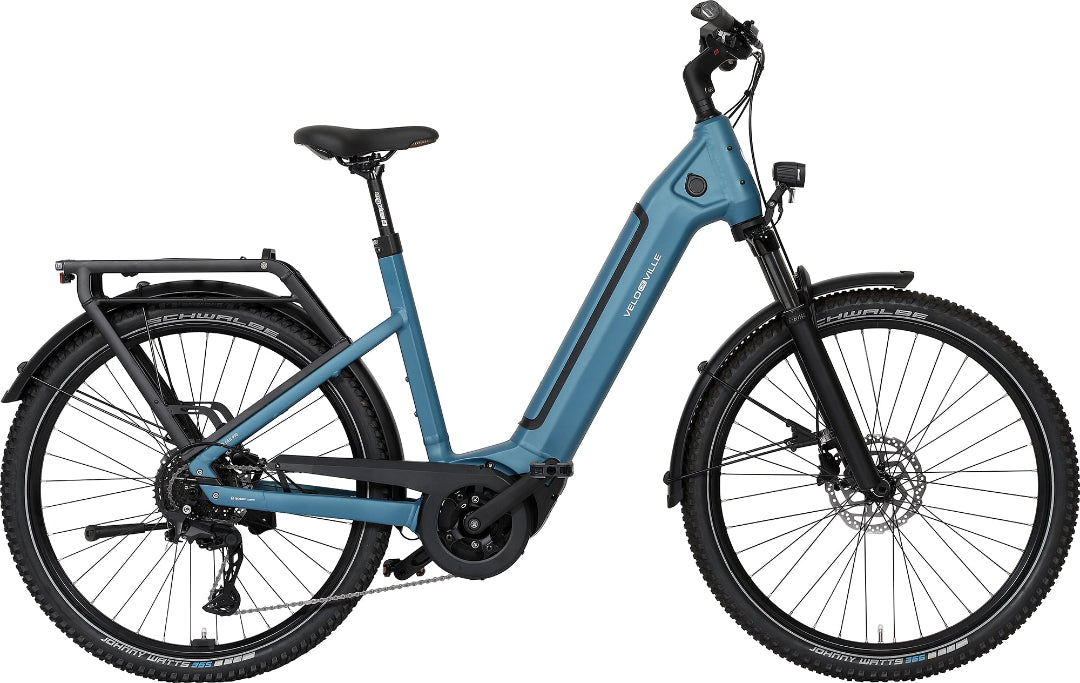 A product image of the VELO DE VILLE SEB electric bike, featuring a Petrol Blue frame colour.