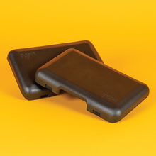 Load image into Gallery viewer, Padded rear seat installed on an orange electric cargo bike, designed for carrying passengers comfortably on the back rack.
