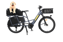Load image into Gallery viewer, A product image showing the right side of the Yuba Boda Boda electric longtail cargo bike with the Wooftop dog carrying basket attached to the rear.
