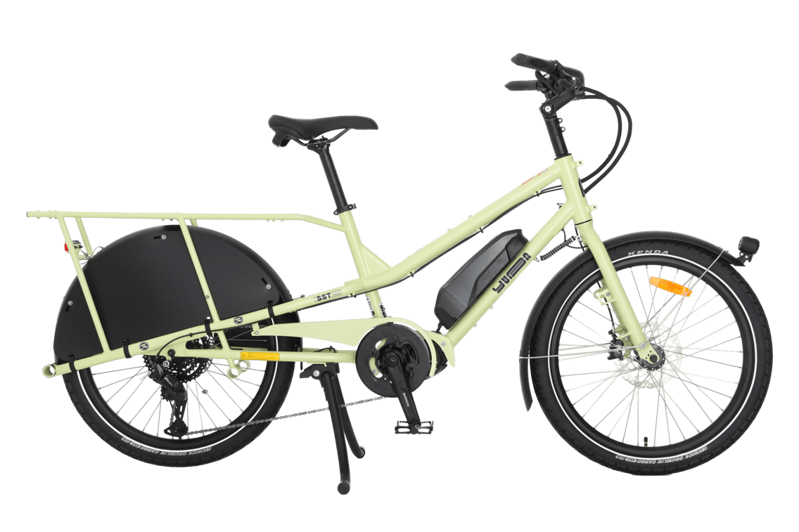 Yuba Kombi EP5 electric longtail cargo bike with no accessories. The frame colour is mint green. 