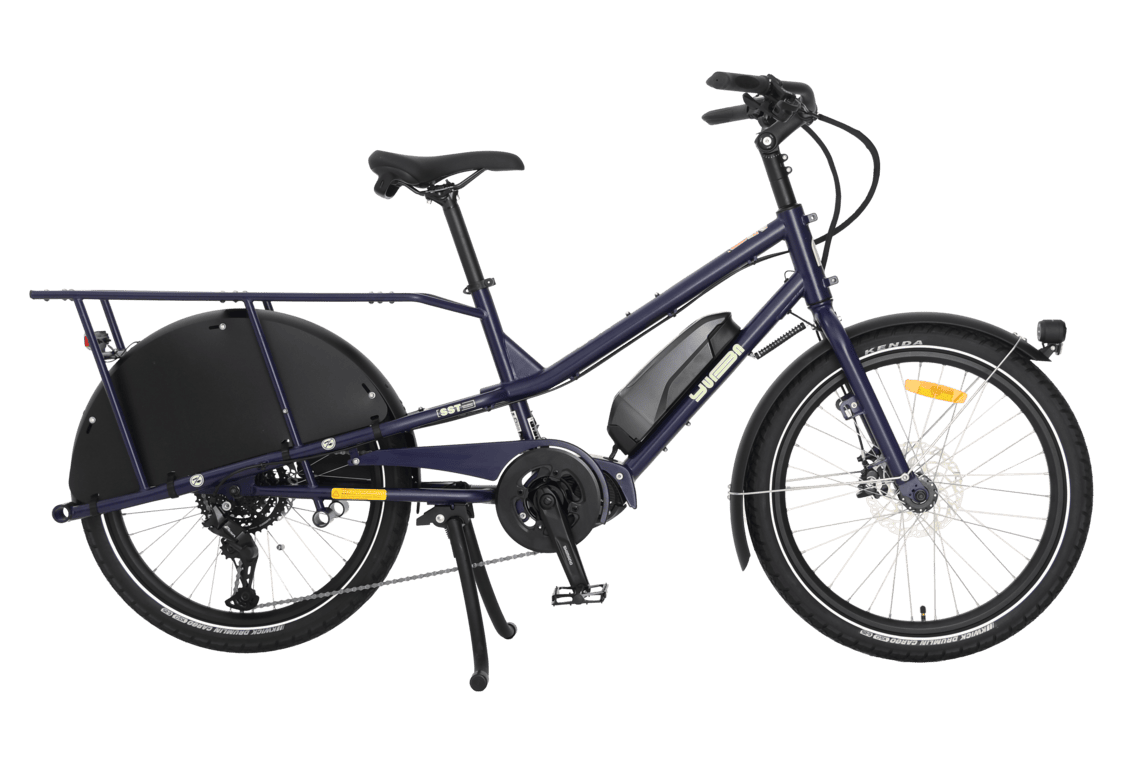 Yuba Kombi EP5 electric longtail cargo bike with no accessories. The frame colour is myrtillo. 