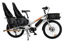 Load image into Gallery viewer, A product image of the Yuba Kombi E5 Electric longtail cargo bike from LeaseBike by Bleeper. The photo shows two child seats attached to the rear rack and a bread basket attached to the front of the bike. 
