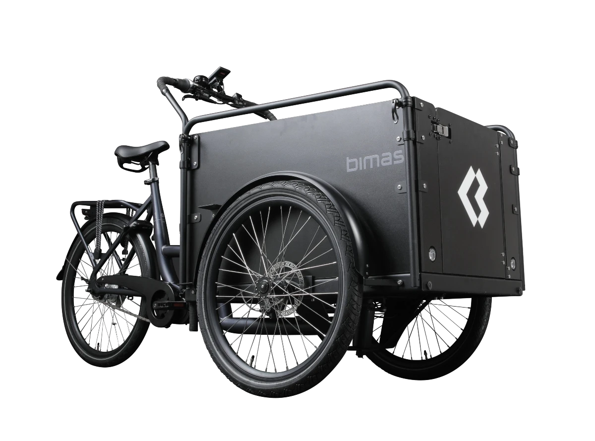 Product image of the Bimas eCargo 3.3 Premium electric cargo bike, shown from the right hand side. The bike frame and cargo box are both black. This image shows the hinged door on the front of the cargo box.