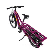 Load image into Gallery viewer, A product image of the Yuba Spicy Curry V4 electric bike taken from an overhead angle. The frame colour is Very Berry (a red grape colour) and the bike is in its basic set up, with no accessories attached. 
