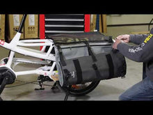Load and play video in Gallery viewer, A graphic video of how to install the Yuba 2-Go Cargo Bag on a Yuba Longtail Cargo e-Bike.
